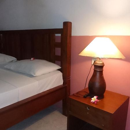 Kputra Homestay Amed Habitación foto