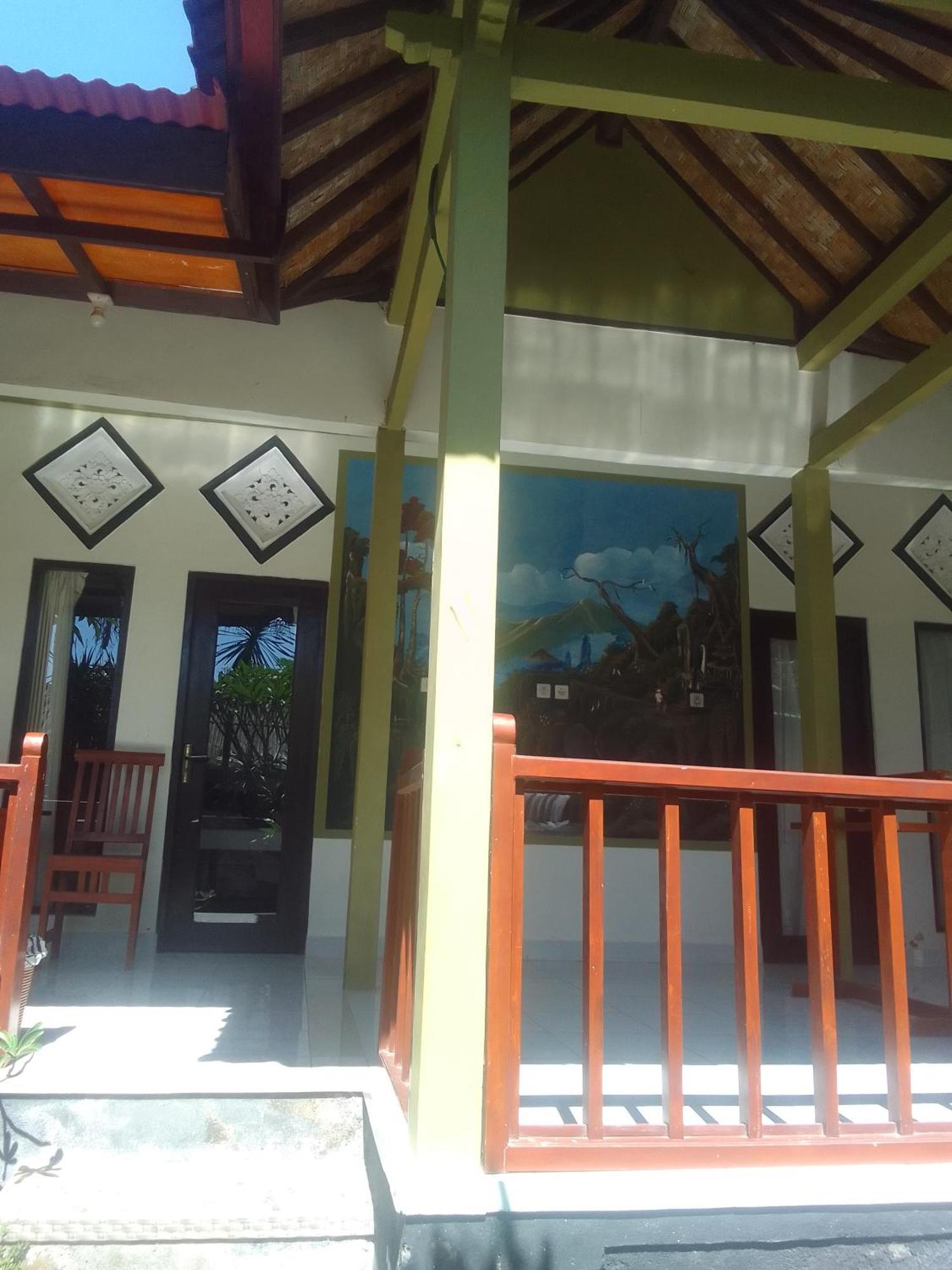 Kputra Homestay Amed Habitación foto
